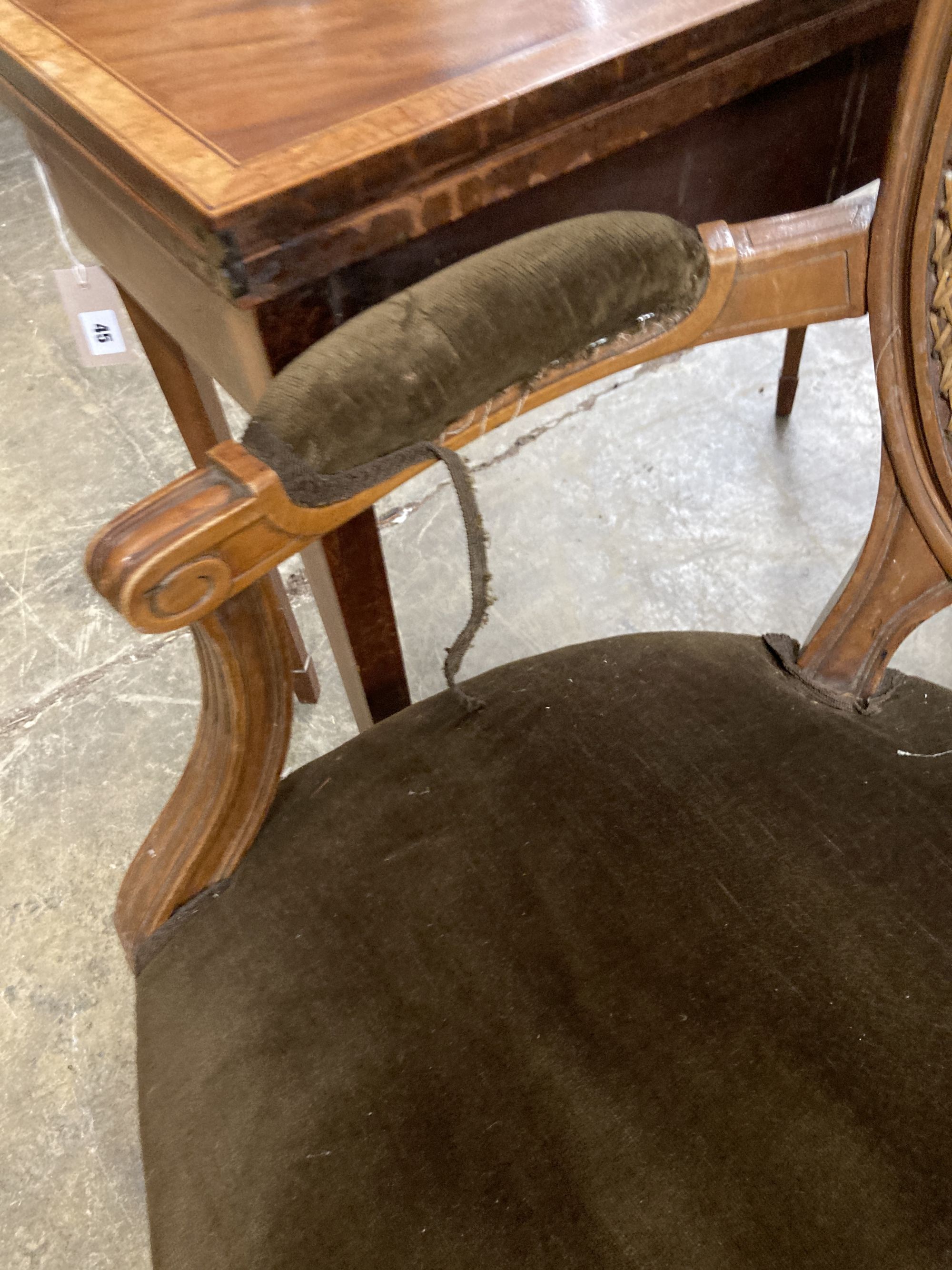 A pair of Louis XVI style caned back fauteuils